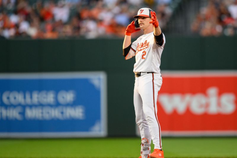 Jun 12, 2024; Baltimore, Maryland, USA; Baltimore Orioles shortstop Gunnar Henderson (2) reacts after hits a double during the sixth inning against the Atlanta Braves at Oriole Park at Camden Yards. Mandatory Credit: Reggie Hildred-USA TODAY Sports