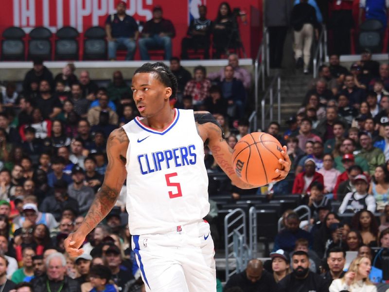 LOS ANGELES, CA - MARCH 17: Bones Hyland #5 of the LA Clippers drives to the basket during the game against the Atlanta Hawks on March 17, 2024 at Crypto.Com Arena in Los Angeles, California. NOTE TO USER: User expressly acknowledges and agrees that, by downloading and/or using this Photograph, user is consenting to the terms and conditions of the Getty Images License Agreement. Mandatory Copyright Notice: Copyright 2024 NBAE (Photo by Adam Pantozzi/NBAE via Getty Images)