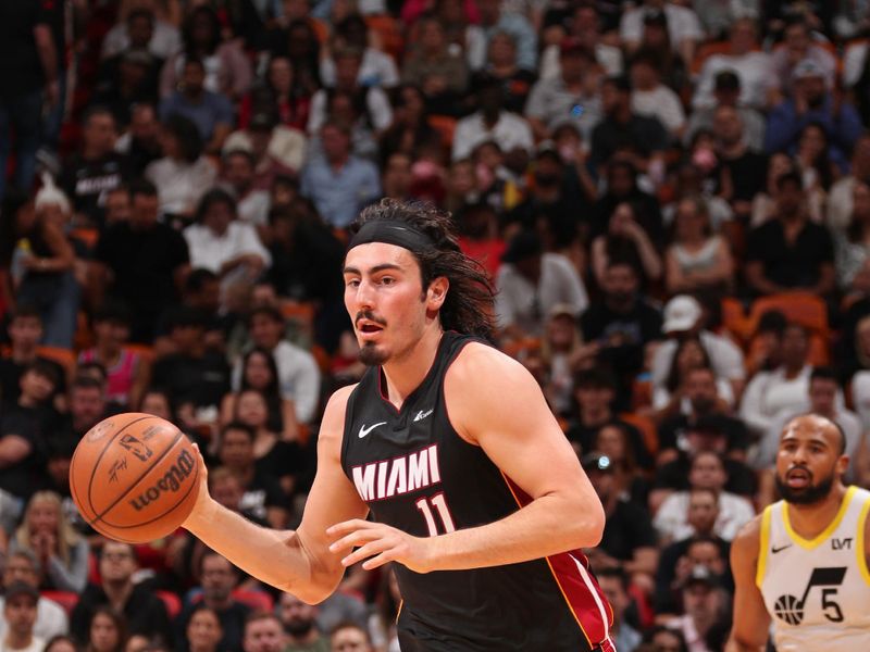 MIAMI, FL - MARCH 2: Jaime Jaquez Jr. #11 of the Miami Heat brings the ball up court during the game against the Utah Jazz on March 2, 2024 at Kaseya Center in Miami, Florida. NOTE TO USER: User expressly acknowledges and agrees that, by downloading and or using this Photograph, user is consenting to the terms and conditions of the Getty Images License Agreement. Mandatory Copyright Notice: Copyright 2024 NBAE (Photo by Issac Baldizon/NBAE via Getty Images)