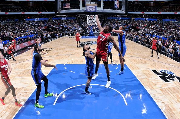 ORLANDO, FL - DECEMBER 20: Thomas Bryant #31 of the Miami Heat drives to the basket during the game against the Orlando Magic on December 20, 2023 at the Kia Center in Orlando, Florida. NOTE TO USER: User expressly acknowledges and agrees that, by downloading and or using this photograph, User is consenting to the terms and conditions of the Getty Images License Agreement. Mandatory Copyright Notice: Copyright 2023 NBAE (Photo by Fernando Medina/NBAE via Getty Images)