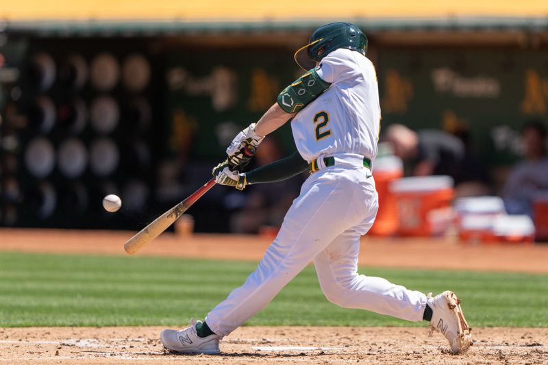 Aug 6, 2023; Oakland, California, USA;  Oakland Athletics shortstop Nick Allen (2) hits a two-run home run during the second inning against the San Francisco Giants at Oakland-Alameda County Coliseum. Mandatory Credit: Stan Szeto-USA TODAY Sports