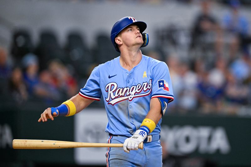 Sep 1, 2024; Arlington, Texas, USA; Texas Rangers third baseman Josh Jung (6) reacts to striking out against the Oakland Athletics during the eighth inning at Globe Life Field. Mandatory Credit: Jerome Miron-USA TODAY Sports