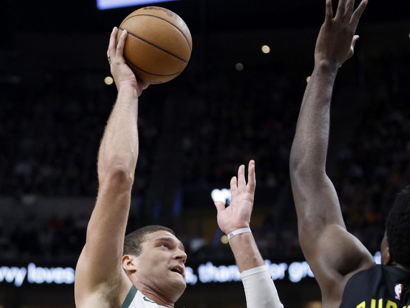 SALT LAKE CITY, UT - MARCH 24: Brook Lopez #11 of the Milwaukee Bucks shoots the ball against the Utah Jazz on March 24, 2023 at vivint.SmartHome Arena in Salt Lake City, Utah. NOTE TO USER: User expressly acknowledges and agrees that, by downloading and or using this Photograph, User is consenting to the terms and conditions of the Getty Images License Agreement. Mandatory Copyright Notice: Copyright 2023 NBAE (Photo by Jeff Swinger/NBAE via Getty Images)