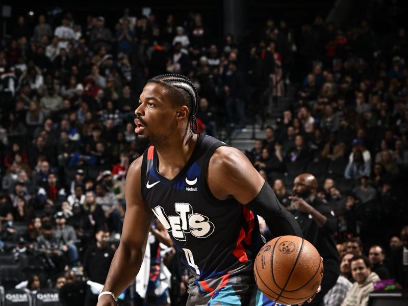 BROOKLYN, NY - JANUARY 27: Dennis Smith Jr. #4 of the Brooklyn Nets dribbles the ball during the game against the Houston Rockets on January 27, 2024 at Barclays Center in Brooklyn, New York. NOTE TO USER: User expressly acknowledges and agrees that, by downloading and or using this Photograph, user is consenting to the terms and conditions of the Getty Images License Agreement. Mandatory Copyright Notice: Copyright 2024 NBAE (Photo by David Dow/NBAE via Getty Images)