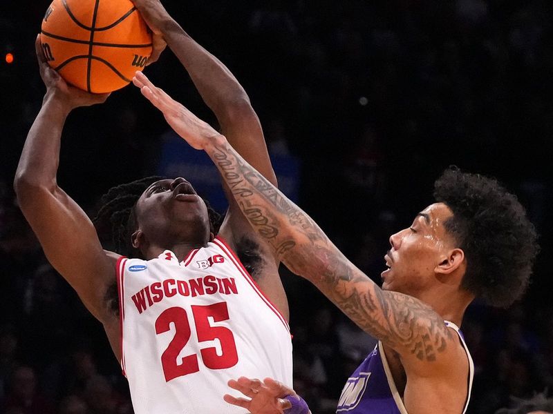 Mar 22, 2024; Brooklyn, NY, USA; Wisconsin Badgers guard John Blackwell (25) shoots the ball against James Madison Dukes guard Terrence Edwards Jr. (5) in the first round of the 2024 NCAA Tournament at the Barclays Center.  Mandatory Credit: Robert Deutsch-USA TODAY Sports