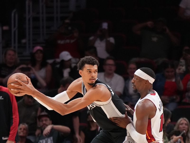 MIAMI, FL - OCTOBER 15: Victor Wembanyama #1 of the San Antonio Spurs handles the ball during the game against the Miami Heat during a NBA preseason game on October 15, 2024 at Kaseya Center in Miami, Florida. NOTE TO USER: User expressly acknowledges and agrees that, by downloading and or using this Photograph, user is consenting to the terms and conditions of the Getty Images License Agreement. Mandatory Copyright Notice: Copyright 2024 NBAE (Photo by Jesse D. Garrabrant/NBAE via Getty Images)