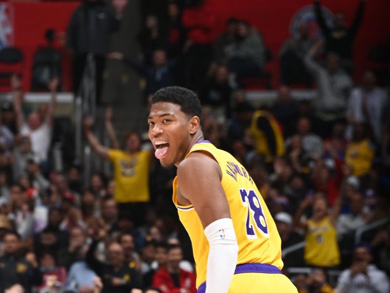 LOS ANGELES, CA - FEBRUARY 28: Rui Hachimura #28 of the Los Angeles Lakers celebrates during the game after hitting the go ahead basket against the LA Clippers on February 28, 2024 at Crypto.Com Arena in Los Angeles, California. NOTE TO USER: User expressly acknowledges and agrees that, by downloading and/or using this Photograph, user is consenting to the terms and conditions of the Getty Images License Agreement. Mandatory Copyright Notice: Copyright 2024 NBAE (Photo by Andrew D. Bernstein/NBAE via Getty Images)