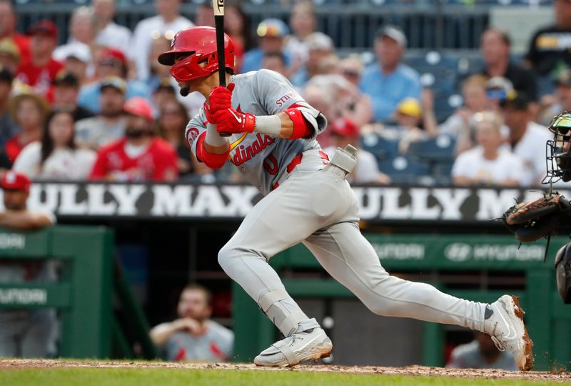 Jul 3, 2024; Pittsburgh, Pennsylvania, USA;  St. Louis Cardinals shortstop Masyn Winn (0) hits an RBI single against the Pittsburgh Pirates during the fifth inning at PNC Park. Mandatory Credit: Charles LeClaire-USA TODAY Sports