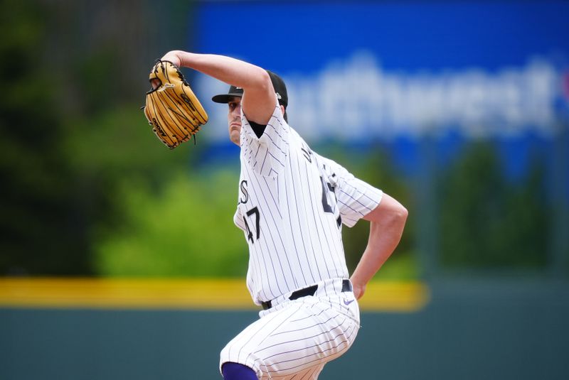 May 9, 2024; Denver, Colorado, USA; Colorado Rockies starting pitcher Cal Quantrill (47) delivers a pitch in the first inning against the San Francisco Giants at Coors Field. Mandatory Credit: Ron Chenoy-USA TODAY Sports