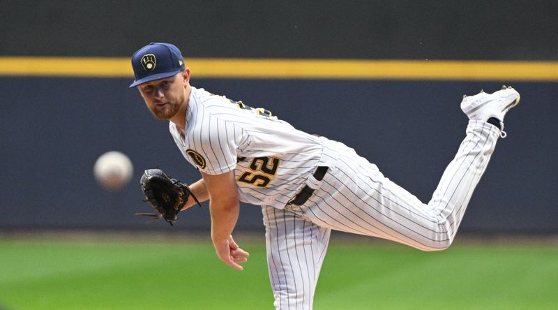 Sep 30, 2023; Milwaukee, Wisconsin, USA; Milwaukee Brewers starting pitcher Eric Lauer (52) delivers a pitch against the Chicago Cubs in the first inning at American Family Field. Mandatory Credit: Michael McLoone-USA TODAY Sports