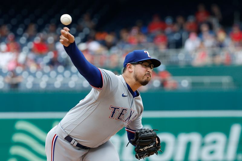 Jul 9, 2023; Washington, District of Columbia, USA; Texas Rangers starting pitcher Dane Dunning (33) pitches against the Washington Nationals during the first inning at Nationals Park. Mandatory Credit: Geoff Burke-USA TODAY Sports