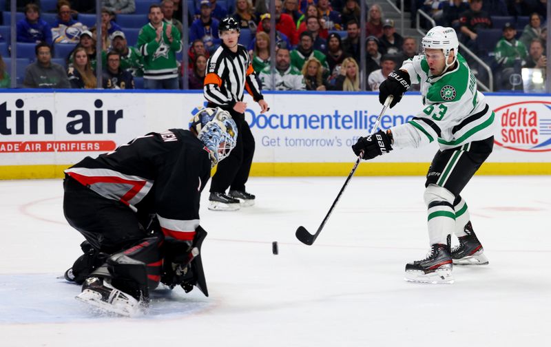 Feb 6, 2024; Buffalo, New York, USA;  Buffalo Sabres goaltender Ukko-Pekka Luukkonen (1) makes a save on Dallas Stars right wing Evgenii Dadonov (63) during the third period at KeyBank Center. Mandatory Credit: Timothy T. Ludwig-USA TODAY Sports