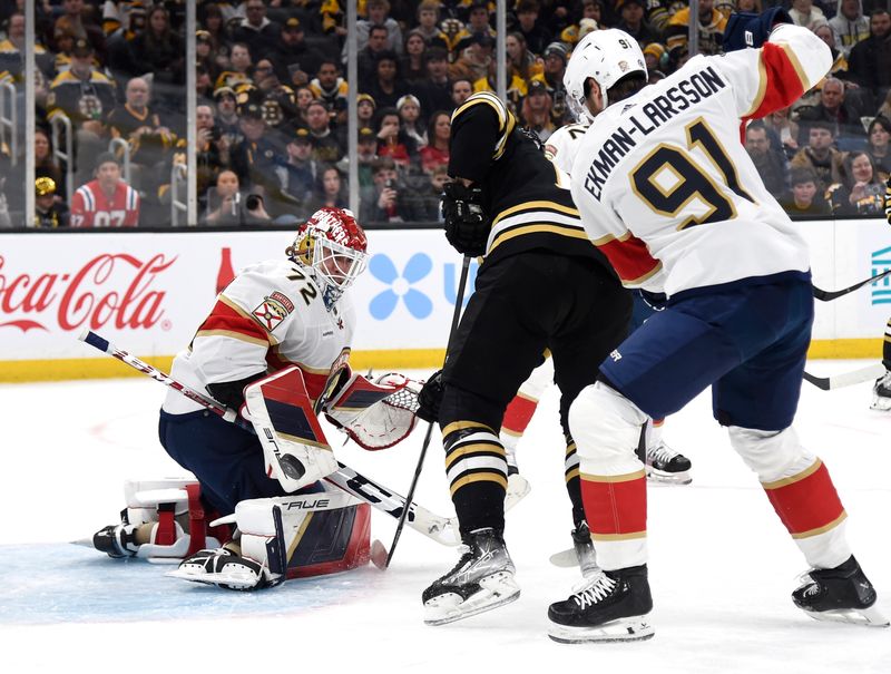 Apr 6, 2024; Boston, Massachusetts, USA; Florida Panthers goaltender Sergei Bobrovsky (72) makes a save in front of Boston Bruins center Charlie Coyle (13) during the first period at TD Garden. Mandatory Credit: Bob DeChiara-USA TODAY Sports