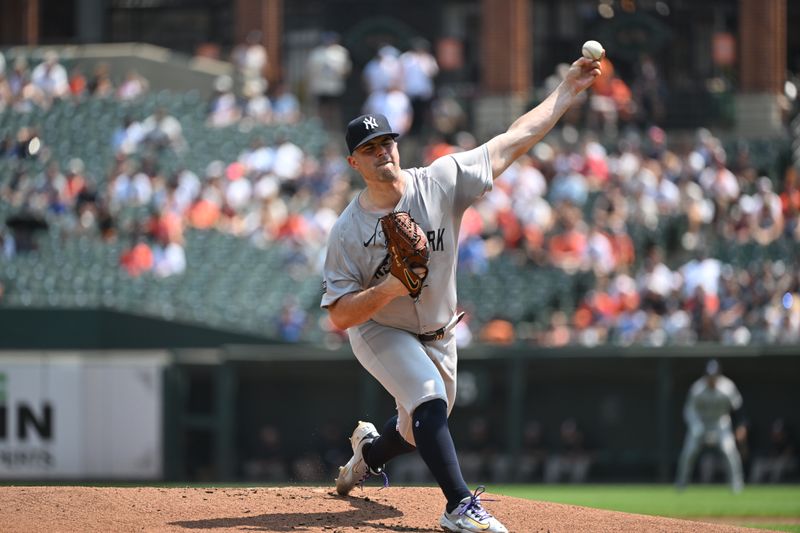 Jul 14, 2024; Baltimore, Maryland, USA;  New York Yankees pitcher Carlos Rodón (55) delivers a first inning pitch against the New York Yankees at Oriole Park at Camden Yards. Mandatory Credit: James A. Pittman-USA TODAY Sports