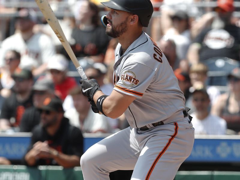 Jul 16, 2023; Pittsburgh, Pennsylvania, USA; San Francisco Giants right fielder Michael Conforto (8) hits a single against the Pittsburgh Pirates during the first inning at PNC Park. Mandatory Credit: Charles LeClaire-USA TODAY Sports