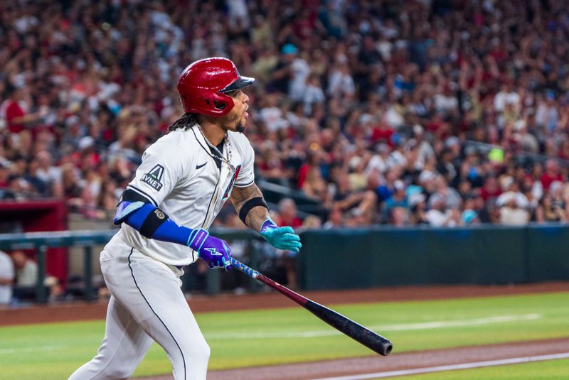 Aug 10, 2024; Phoenix, Arizona, USA; Arizona Diamondbacks infielder Ketel Marte (4) reacts after hitting a home run in the first inning against the Philadelphia Phillies at Chase Field. Mandatory Credit: Allan Henry-USA TODAY Sports