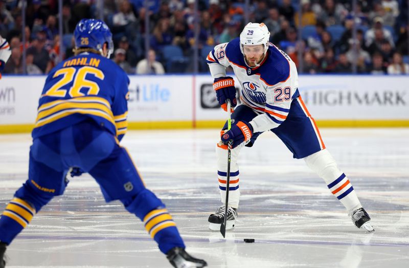 Mar 9, 2024; Buffalo, New York, USA;  Edmonton Oilers center Leon Draisaitl (29) skates up ice with the puck during the third period against the Buffalo Sabres at KeyBank Center. Mandatory Credit: Timothy T. Ludwig-USA TODAY Sports