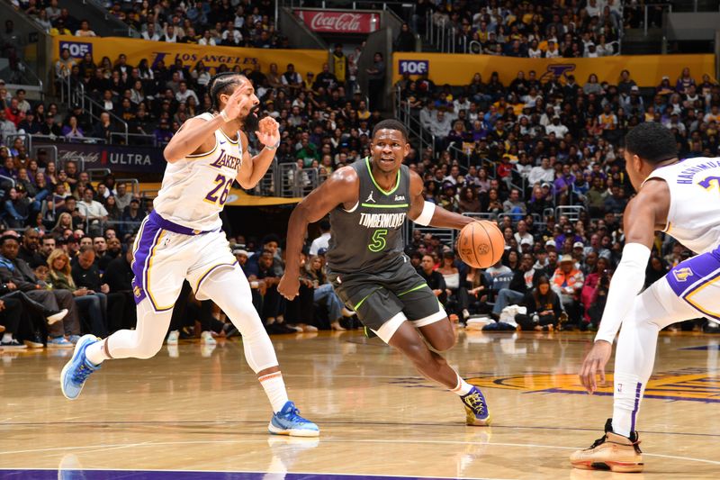 LOS ANGELES, CA - APRIL 7: Anthony Edwards #5 of the Minnesota Timberwolves dribbles the ball during the game against the Los Angeles Lakers on April 7, 2024 at Crypto.Com Arena in Los Angeles, California. NOTE TO USER: User expressly acknowledges and agrees that, by downloading and/or using this Photograph, user is consenting to the terms and conditions of the Getty Images License Agreement. Mandatory Copyright Notice: Copyright 2024 NBAE (Photo by Juan Ocampo/NBAE via Getty Images)