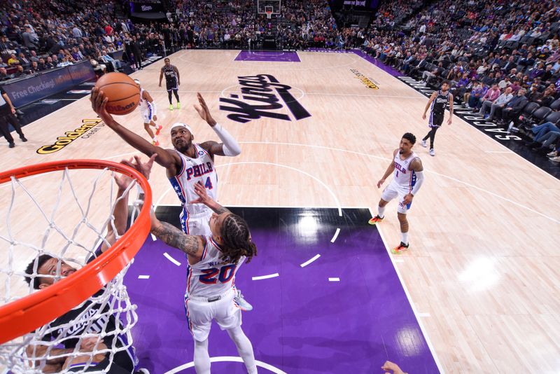 SACRAMENTO, CA - MARCH 25:  Paul Reed #44 of the Philadelphia 76ers grabs the rebound during the game on March 25, 2024 at Golden 1 Center in Sacramento, California. NOTE TO USER: User expressly acknowledges and agrees that, by downloading and or using this Photograph, user is consenting to the terms and conditions of the Getty Images License Agreement. Mandatory Copyright Notice: Copyright 2024 NBAE (Photo by Rocky Widner/NBAE via Getty Images)