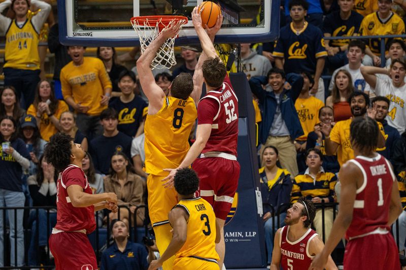 Feb 21, 2026; Berkeley, California, USA;  Stanford Cardinal forward Aidan Cammann (52) blocks the shot of California Golden Bears center Milos Ilic (8) during the first half at Haas Pavilion. Mandatory Credit: Neville E. Guard-Imagn Images