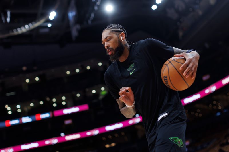 TORONTO, CANADA - MARCH 5: Brandon Ingram #14 of the New Orleans Pelicans warms up ahead of their NBA game against the Toronto Raptors at Scotiabank Arena on March 5, 2024 in Toronto, Canada. NOTE TO USER: User expressly acknowledges and agrees that, by downloading and or using this photograph, User is consenting to the terms and conditions of the Getty Images License Agreement. (Photo by Cole Burston/Getty Images)