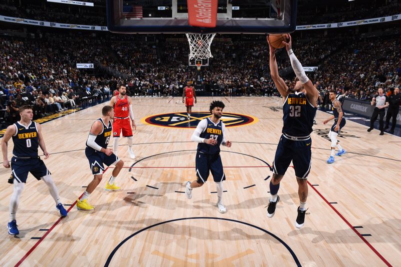 DENVER, CO - APRIL 21:   Aaron Gordon #32 of the Denver Nuggets goes up for the rebound during the game against the LA Clippers during Round 1 Game 2 of the 2025 NBA Playoffs on April 21, 2025 at Ball Arena in Denver, Colorado. NOTE TO USER: User expressly acknowledges and agrees that, by downloading and/or using this Photograph, user is consenting to the terms and conditions of the Getty Images License Agreement. Mandatory Copyright Notice: Copyright 2025 NBAE (Photo by Garrett Ellwood/NBAE via Getty Images)