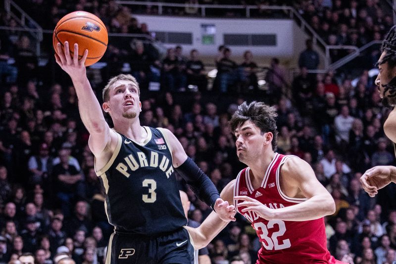 Feb 10, 2024; West Lafayette, Indiana, USA; Purdue Boilermakers guard Braden Smith (3) shoots the ball while Indiana Hoosiers guard Trey Galloway (32) defends in the second half at Mackey Arena. Mandatory Credit: Trevor Ruszkowski-USA TODAY Sports