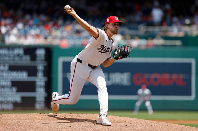 Jul 21, 2024; Washington, District of Columbia, USA; Washington Nationals starting pitcher Jake Irvin (27) pitches against the Cincinnati Reds during the first inning at Nationals Park. Mandatory Credit: Geoff Burke-USA TODAY Sports