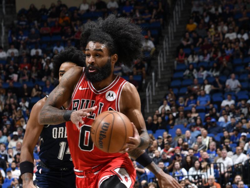 ORLANDO, FL - FEBRUARY 10: Coby White #0 of the Chicago Bulls dribbles the ball during the game against the Orlando Magic on February 10, 2024 at the Kia Center in Orlando, Florida. NOTE TO USER: User expressly acknowledges and agrees that, by downloading and or using this photograph, User is consenting to the terms and conditions of the Getty Images License Agreement. Mandatory Copyright Notice: Copyright 2024 NBAE (Photo by Fernando Medina/NBAE via Getty Images)