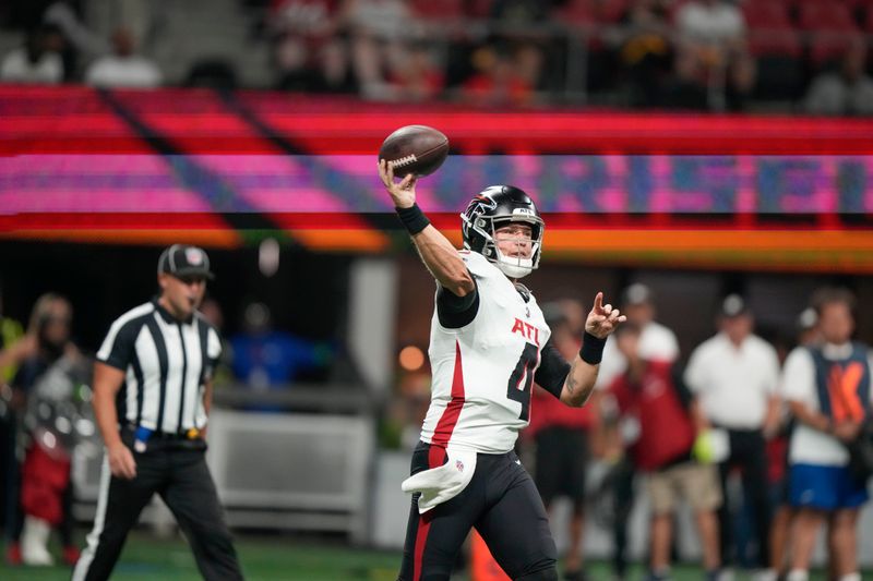 Atlanta Falcons quarterback Taylor Heinicke (4) passes in the first half of an NFL football game against the Pittsburgh Steelers in Atlanta, Thursday, Aug. 24, 2023. (AP Photo/Gerald Herbert)