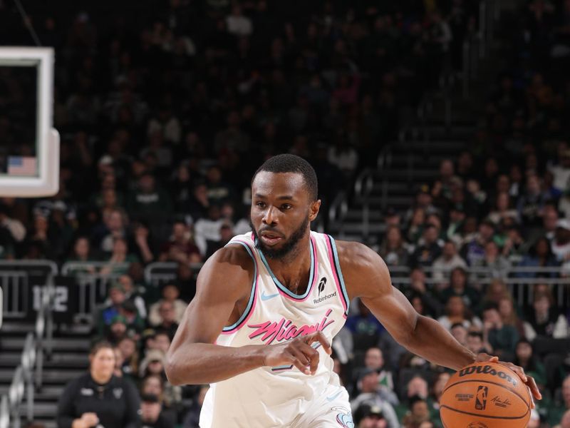 MILWAUKEE, WI - FEBRUARY 23: Andrew Wiggins #22 of the Miami Heat dribbles the ball during the game against the Milwaukee Bucks on February 23, 2025 at Fiserv Forum Center in Milwaukee, Wisconsin. NOTE TO USER: User expressly acknowledges and agrees that, by downloading and or using this Photograph, user is consenting to the terms and conditions of the Getty Images License Agreement. Mandatory Copyright Notice: Copyright 2025 NBAE (Photo by Gary Dineen/NBAE via Getty Images).