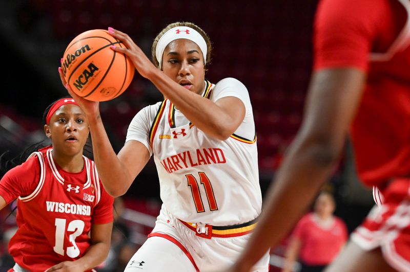 Feb 29, 2024; College Park, Maryland, USA;  Maryland Terrapins guard Jakia Brown-Turner (11) makes move to the basket against the Wisconsin Badgers during the second half at Xfinity Center. Mandatory Credit: Tommy Gilligan-USA TODAY Sports