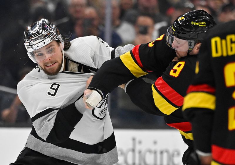 Apr 10, 2023; Los Angeles, California, USA;  Vancouver Canucks center J.T. Miller (9) and Los Angeles Kings right wing Adrian Kempe (9) fight in the second period at Crypto.com Arena. Mandatory Credit: Jayne Kamin-Oncea-USA TODAY Sports