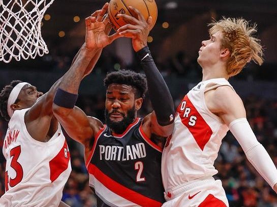 TORONTO, ON - OCTOBER 30: Portland Trail Blazers center Deandre Ayton (2) splits the defence of Toronto Raptors forward Pascal Siakam (43) and Toronto Raptors guard Gradey Dick (1). Toronto Raptors vs Portland Trailblazers during 2nd half action of NBA regular season play at Scotiabank Arena. Raptors lost 99-91. Toronto Star<p><br/></p>        (Rick Madonik/Toronto Star via Getty Images)