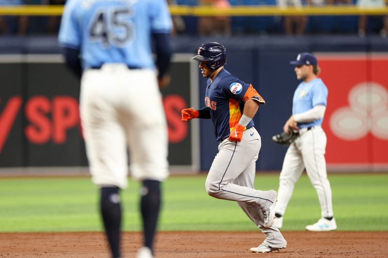 Aug 12, 2024; St. Petersburg, Florida, USA; Houston Astros catcher Yainer Diaz (21) runs the bases after hitting a three run home run against the Tampa Bay Rays in the third inning at Tropicana Field. Mandatory Credit: Nathan Ray Seebeck-USA TODAY Sports