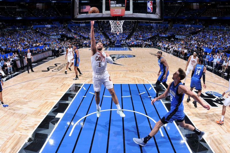 ORLANDO, FL - APRIL 25: Max Strus #1 of the Cleveland Cavaliers goes to the basket during the game against the Orlando Magic during Round 1 Game 3 of the 2024 NBA Playoffs on April 25, 2024 at Kia Center in Orlando, Florida. NOTE TO USER: User expressly acknowledges and agrees that, by downloading and or using this photograph, User is consenting to the terms and conditions of the Getty Images License Agreement. Mandatory Copyright Notice: Copyright 2023 NBAE (Photo by Fernando Medina/NBAE via Getty Images)