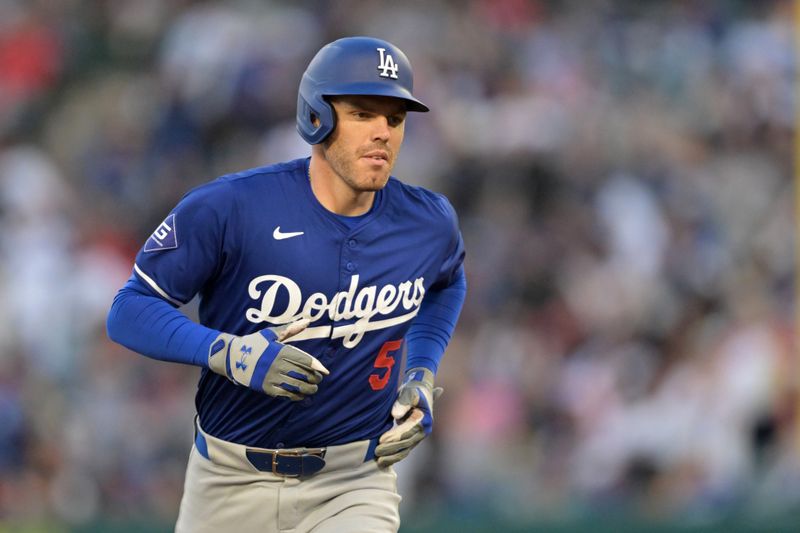 Mar 26, 2024; Anaheim, California, USA; Los Angeles Dodgers first baseman Freddie Freeman (5) rounds the bases after hitting a solo home run in the third inning against the Los Angeles Angels at Angel Stadium. Mandatory Credit: Jayne Kamin-Oncea-USA TODAY Sports