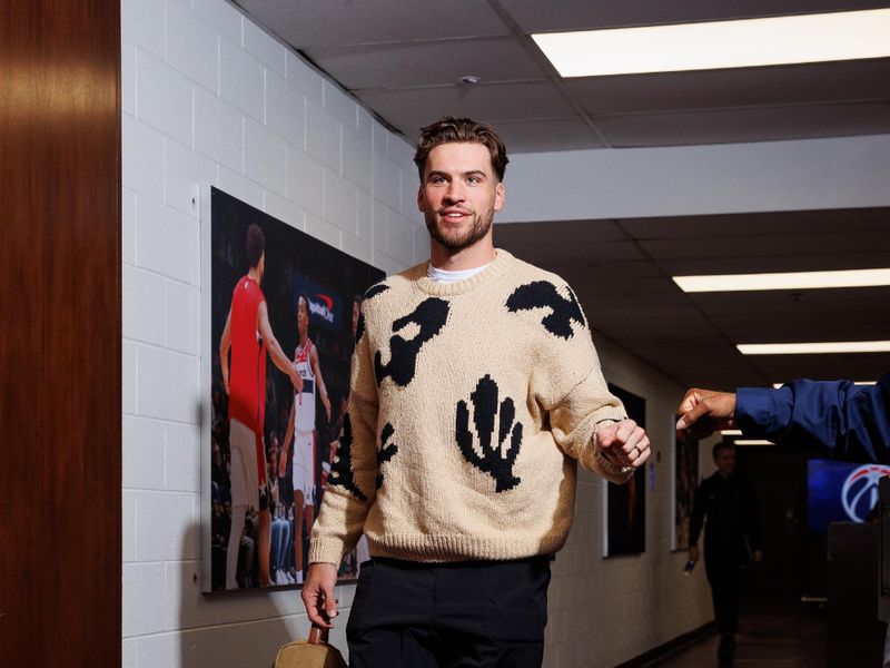 WASHINGTON, DC -? MARCH 23:  Corey Kispert #24 of the Washington Wizards arrives to the arena before the game on March 23, 2024 at Capital One Arena in Washington, DC. NOTE TO USER: User expressly acknowledges and agrees that, by downloading and or using this Photograph, user is consenting to the terms and conditions of the Getty Images License Agreement. Mandatory Copyright Notice: Copyright 2024 NBAE (Photo by Kenny Giarla/NBAE via Getty Images)