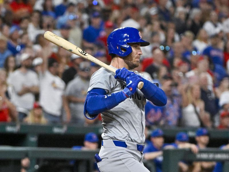May 25, 2024; St. Louis, Missouri, USA;  Chicago Cubs center fielder Cody Bellinger (24) hits a one run single against the St. Louis Cardinals during the ninth inning at Busch Stadium. Mandatory Credit: Jeff Curry-USA TODAY Sports