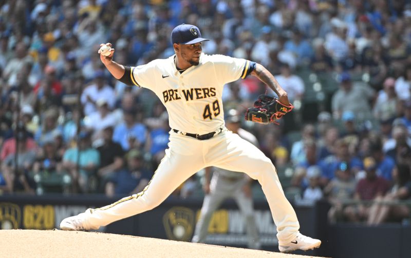 Jun 21, 2023; Milwaukee, Wisconsin, USA; Milwaukee Brewers starting pitcher Julio Teheran (49) delivers a pitch against the Arizona Diamondbacks in the first inning at American Family Field. Mandatory Credit: Michael McLoone-USA TODAY Sports