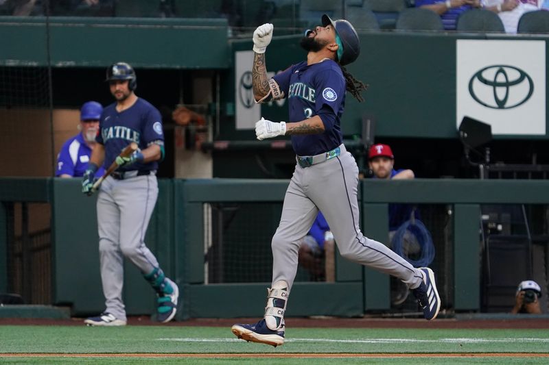 May 3, 2025; Arlington, Texas, USA; Seattle Mariners shortstop J.P. Crawford (3) reacts as he rounds the bases after hitting a lead off home run during the first inning against the Texas Rangers at Globe Life Field. Mandatory Credit: Raymond Carlin III-Imagn Images