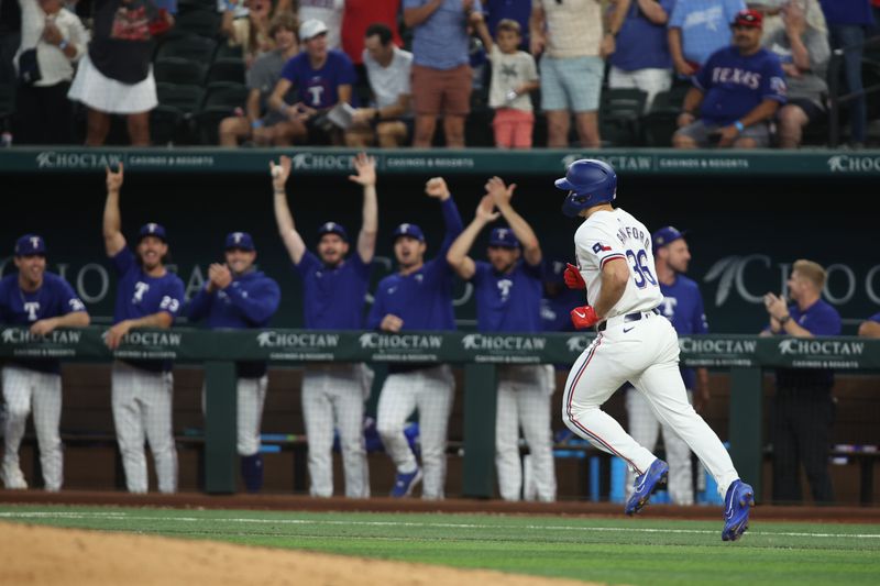 Jun 22, 2024; Arlington, Texas, USA; Texas Rangers left fielder Wyatt Langford (36) rounds the bases after hitting a grand slam home run in the eighth inning against the Kansas City Royals at Globe Life Field. Mandatory Credit: Tim Heitman-USA TODAY Sports