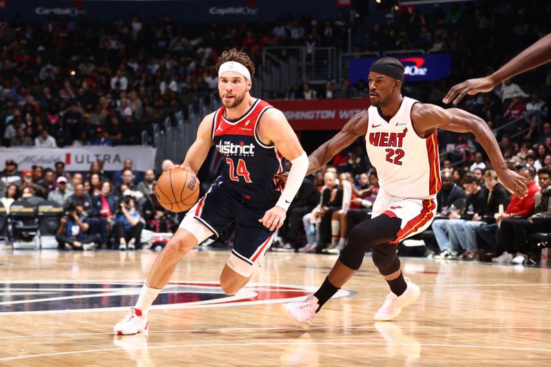 WASHINGTON, DC -? MARCH 31: Corey Kispert #24 of the Washington Wizards handles the ball during the game against the Miami Heat on March 31, 2024 at Capital One Arena in Washington, DC. NOTE TO USER: User expressly acknowledges and agrees that, by downloading and or using this Photograph, user is consenting to the terms and conditions of the Getty Images License Agreement. Mandatory Copyright Notice: Copyright 2024 NBAE (Photo by Kenny Giarla/NBAE via Getty Images)