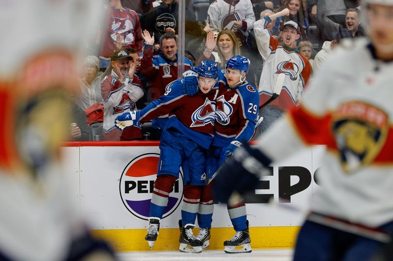 Jan 6, 2024; Denver, Colorado, USA; Colorado Avalanche defenseman Cale Makar (8) celebrates his goal with center Nathan MacKinnon (29) in the second period against the Florida Panthers at Ball Arena. Mandatory Credit: Isaiah J. Downing-USA TODAY Sports