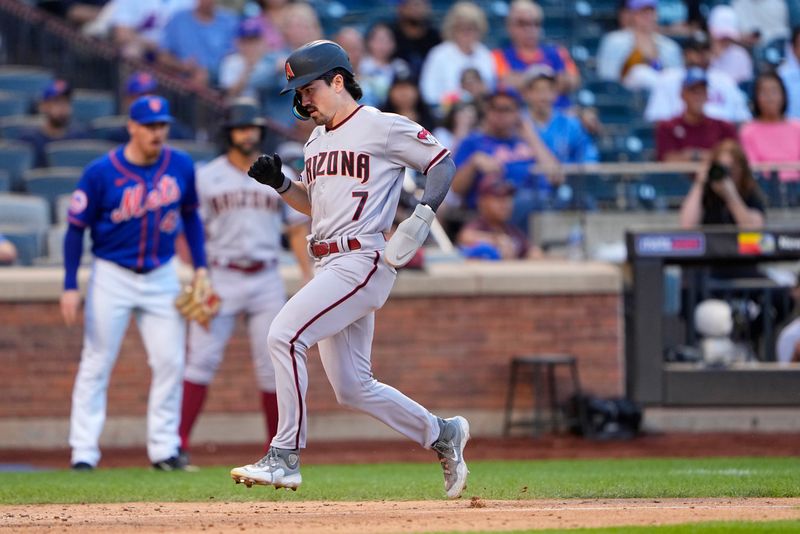 Sep 14, 2023; New York City, New York, USA;  Arizona Diamondbacks right fielder Corbin Carroll (7) scores a run on Arizona Diamondbacks center fielder Jake McCarthy (not pictured) RBI double against the New York Mets during the eighth inning at Citi Field. Mandatory Credit: Gregory Fisher-USA TODAY Sports