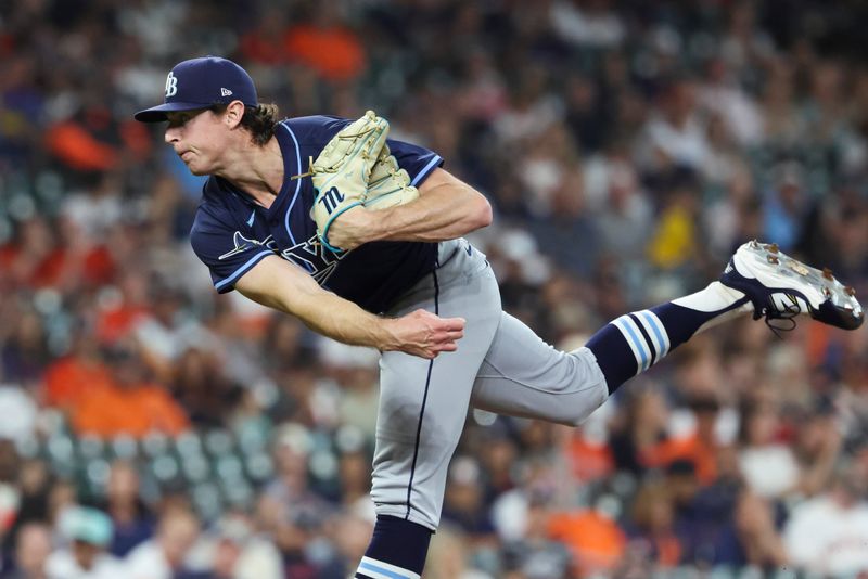 May 30, 2025; Houston, Texas, USA; Tampa Bay Rays starting pitcher Ryan Pepiot (44) delivers a pitch during the first inning against the Houston Astros at Daikin Park. Mandatory Credit: Troy Taormina-Imagn Images