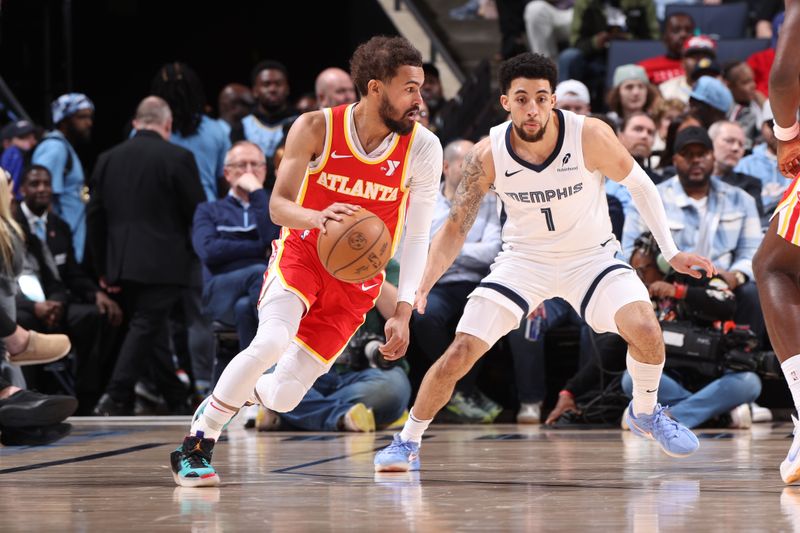 MEMPHIS, TN - MARCH 3: Trae Young #11 of the Atlanta Hawks handles the ball during the game against the Memphis Grizzlies on March 3, 2025 at FedExForum in Memphis, Tennessee. NOTE TO USER: User expressly acknowledges and agrees that, by downloading and or using this photograph, User is consenting to the terms and conditions of the Getty Images License Agreement. Mandatory Copyright Notice: Copyright 2025 NBAE (Photo by Joe Murphy/NBAE via Getty Images)