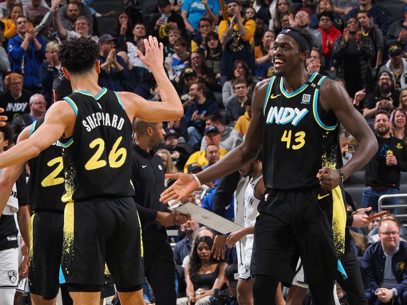 INDIANAPOLIS, IN - MARCH 16: Pascal Siakam #43 and Ben Sheppard #26 of the Indiana Pacers celebrate during the game against the Brooklyn Nets on March 16, 2024 at Gainbridge Fieldhouse in Indianapolis, Indiana. NOTE TO USER: User expressly acknowledges and agrees that, by downloading and or using this Photograph, user is consenting to the terms and conditions of the Getty Images License Agreement. Mandatory Copyright Notice: Copyright 2024 NBAE (Photo by Ron Hoskins/NBAE via Getty Images)