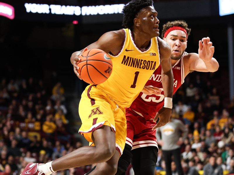 Jan 25, 2023; Minneapolis, Minnesota, USA; Minnesota Golden Gophers forward Joshua Ola-Joseph (1) drives to the basket while Indiana Hoosiers forward Race Thompson (25) defends during the first half at Williams Arena. Mandatory Credit: Matt Krohn-USA TODAY Sports