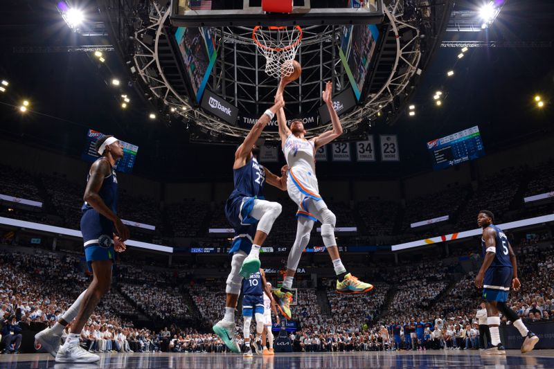 MINNEAPOLIS, MN - MAY 26:  Chet Holmgren #7 of the Oklahoma City Thunder drives to the basket during the game against the Minnesota Timberwolves during Game 4 of the 2025 NBA Western Conference Finals on May 26, 2025 at Target Center in Minneapolis, Minnesota. NOTE TO USER: User expressly acknowledges and agrees that, by downloading and or using this Photograph, user is consenting to the terms and conditions of the Getty Images License Agreement. Mandatory Copyright Notice: Copyright 2025 NBAE (Photo by Jesse D. Garrabrant/NBAE via Getty Images)